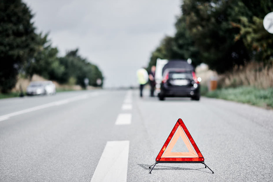 Skorstensgaard mobilitetsservice advarselstrekant på vejen